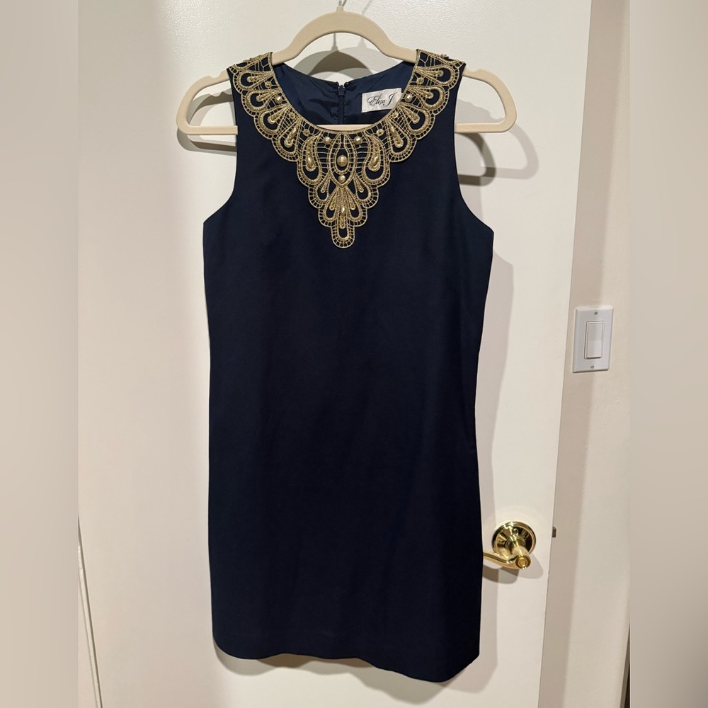 Navy dress with gold collar